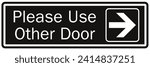 Please use other door directional sign