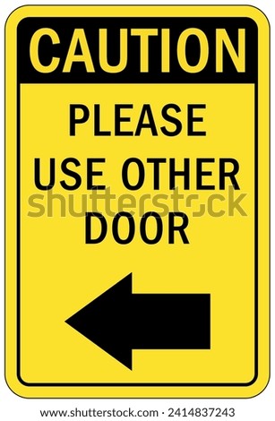 Please use other door directional sign