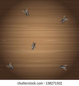 Plenty of flies on the wooden desktop