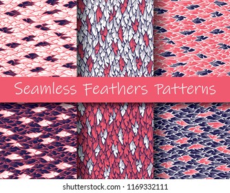 Plumage patterns set. Red, white, dark blue. Colorful vector illustration of seamless feathers patterns in modern hand drawn style. Element for your design, textile, wrapping, wallpaper, decoration.