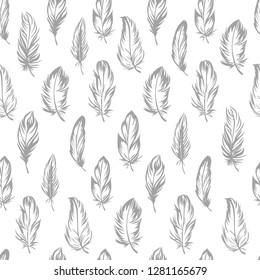 Plumage seamless pattern. Vector isolated plume on white background. Gray feathers. Used for fabric and clothes design, wallpaper, scrapbooking.