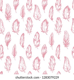 Plumage seamless pattern. Vector isolated plume on white background. Pink feathers. Fabric and clothes design, wallpaper, scrapbooking, stamping, bed linen. Candlelight peach color Pantone 2019.
