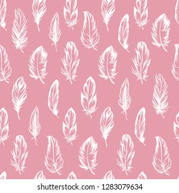 Plumage seamless pattern. Vector isolated plume on pink background. White feathers. Fabric and clothes design, wallpaper, scrapbooking, stamping, bed linen. Candlelight peach color Pantone 2019.