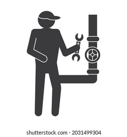 plumber installing pipes with wrench