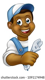 A plumber or mechanic contractor holding a spanner hand tool and peeking around from behind a sign