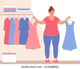 Plump woman stands at  wardrobe, she is holding her old dresses in her hands, which no longer fit, they are too small for her.