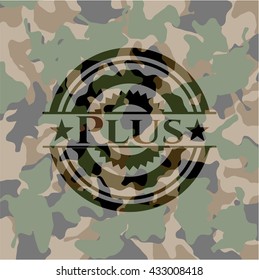 Plus written on a camo texture