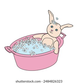 Plush bunny is lying in soapy suds in a pink basin getting washed