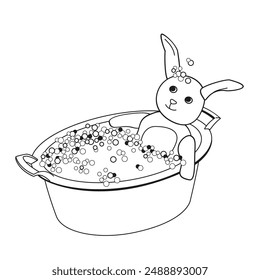 Plush bunny is lying in soapy suds in a  basin getting washed