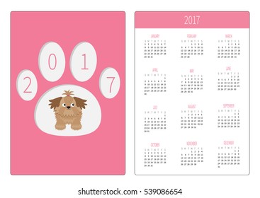 Pocket calendar 2017 year. Week starts Sunday. Flat design Vertical orientation Template. Little glamour tan Shih Tzu dog in the paw print. Vector illustration