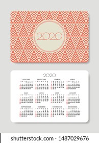 Pocket Calendar 2020 with decorative winter holidays pattern. Vector design template. Week starts on Sunday.