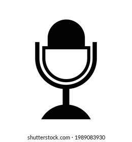 podcast icon. The studio desk microphone is black with the sound broadcast wave symbol. Webcast audio recording concept logo.