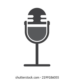 Podcast Icon. The Studio Desk Microphone Is Black With The Sound Broadcast Wave Symbol. Webcast Audio Recording Concept Logo