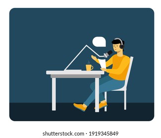 podcast. a man with a microphone sitting at a table