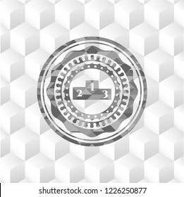 podium icon inside grey badge with geometric cube white background