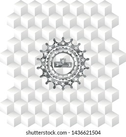 podium icon inside grey emblem with cube white background