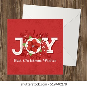 Poinsettia decoration vector illustration for a Red Christmas Greeting Card, on an open envelope resting on a wooden table