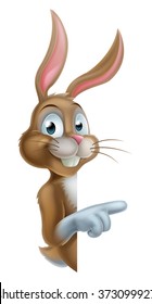 A pointing cartoon Easter bunny rabbit