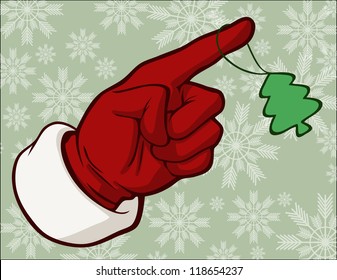 Pointing hand with a christmas tree token