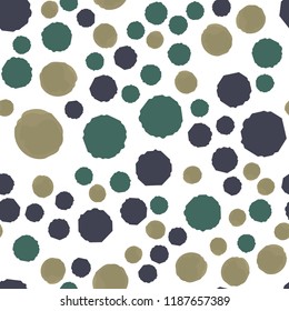 Points in of dark yellow, grayish blue, desaturated cyan. Seamless Pattern. For your design. Vector.
