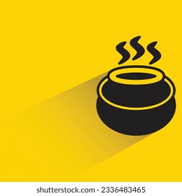 poison pot with shadow on yellow background