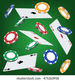 Poker chips and playing cards on green background