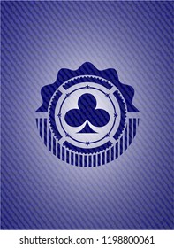 poker clover icon inside badge with denim texture
