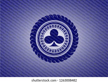 poker clover icon inside badge with denim texture