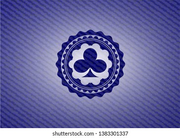 poker clover icon inside badge with jean texture
