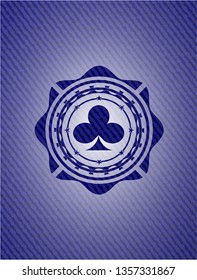 poker clover icon inside emblem with denim texture