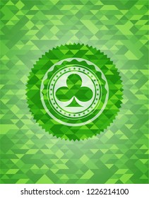 poker clover icon inside green emblem with triangle mosaic background