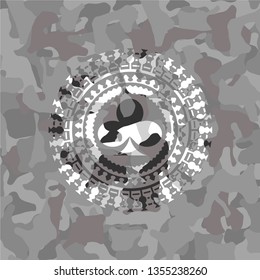 poker clover icon inside grey camo emblem