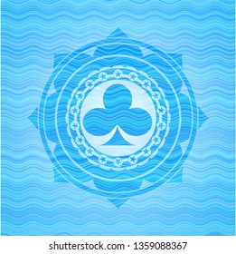 poker clover icon inside light blue water emblem.