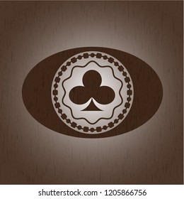 poker clover icon inside realistic wooden emblem