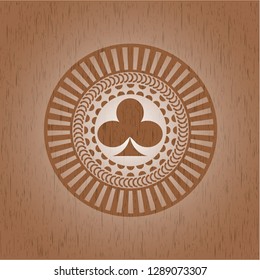 poker clover icon inside wooden emblem