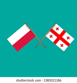 Poland and Georgia crossed flags.Language learning or travel concept