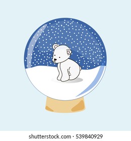 Polar bear cub on the snow inside of snow globe on the light blue background.