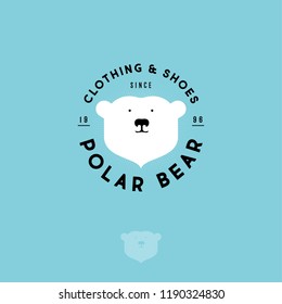Polar bear logo. Clothing and shoes emblem. The head of polar bear and letters on a circle. Sports and warm wears. 