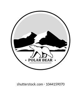 Polar bear symbol on a background of mountains.Vector icon.