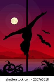 Pole dancer performing pole moves in front of river and full moon at night Halloween Style