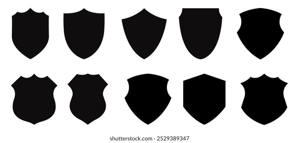 Police badge icon set. Black shield silhouettes for security and football patches