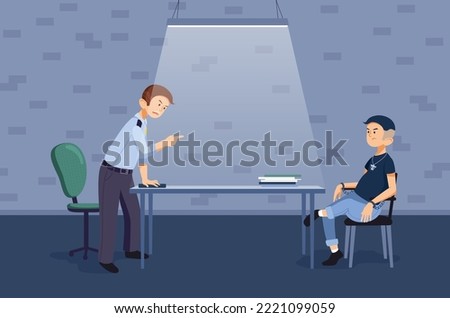 A police officer interrogates a suspect in the interrogation room. The policeman finds out the details of the case from the prisoner. A crime. Young man in handcuffs. Police station. Dark room.
