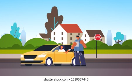 Police Officer Writing Report Parking Fine Or Speeding Ticket For Woman Sitting In Car Showing Driver License Road Traffic Safety Regulations Concept Cityscape Background Full Length Horizontal