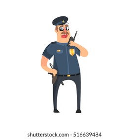 Policeman In American Cop Uniform With Truncheon, Radio, Gun Holster And Sunglasses Speaking To Walkie-Talkie