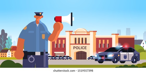 policeman in uniform using loudspeaker making announcement security authority justice law service concept modern police station department building exterior portrait horizontal