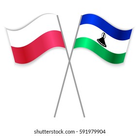 Polish and Basotho crossed flags. Poland combined with Lesotho isolated on white. Language learning, international business or travel concept.