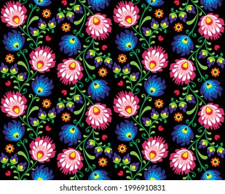 Polish folk art vector pattern with flowers - Wycinanka Lowicka, traditional retro ethnic design on black background. 
Repetitive colorful background, folk art cutouts prints from Poland 