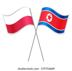 Polish and North Korean crossed flags. Poland combined with North Korea isolated on white. Language learning, international business or travel concept.