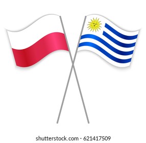 Polish and Uruguayan crossed flags. Poland combined with Uruguay isolated on white. Language learning, international business or travel concept.