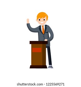 Politician in a jacket and tie. A man in a suit at the podium says. Elections and polling. Active civil position. Lecture and speaker.
